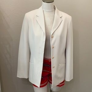 The LIMITED hip length, stretchy blazer, fully lined and freshly dry cleaned.